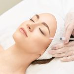 Woman getting Botox-type injectable treatment at a medical spa