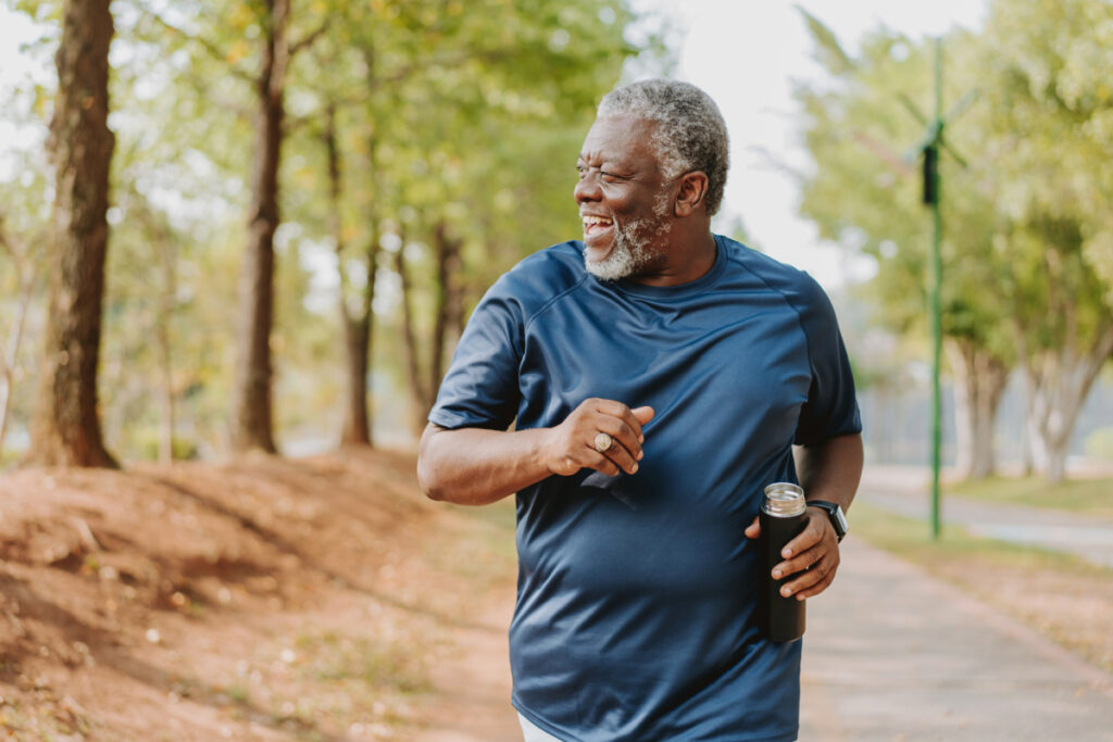 Mature man running outside 