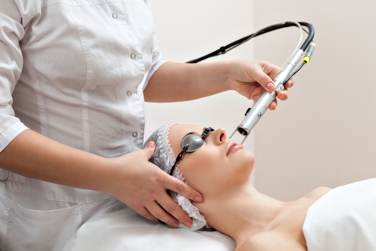 Woman getting a laser skin resurfacing treatment at a med spa
